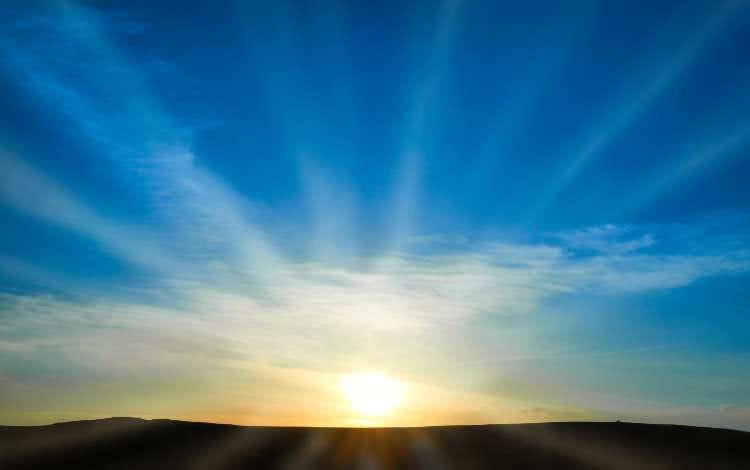 Soft sunrise over the horizon representing gratitude and renewed obedience to God.